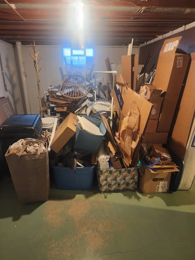 Roll-off dumpster container at job site for Concrete Dumpster Rental in Willington